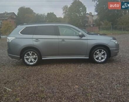 Серый Мицубиси Аутлендер, объемом двигателя 2.27 л и пробегом 232 тыс. км за 12500 $, фото 7 на Automoto.ua