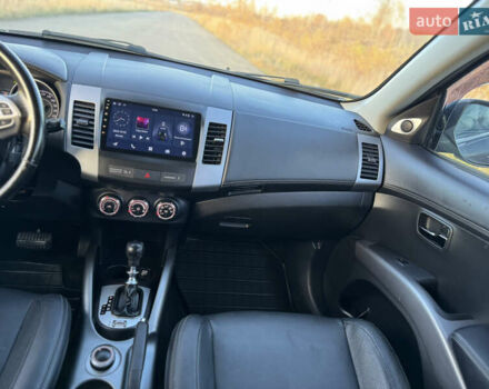 Серый Мицубиси Аутлендер, объемом двигателя 2.2 л и пробегом 171 тыс. км за 12700 $, фото 81 на Automoto.ua