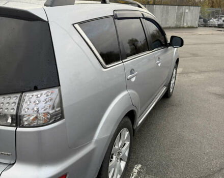 Сірий Міцубісі Аутлендер, об'ємом двигуна 2.27 л та пробігом 310 тис. км за 13000 $, фото 6 на Automoto.ua