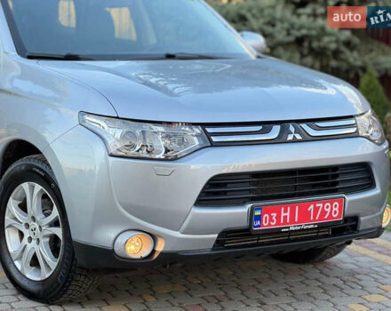 Серый Мицубиси Аутлендер, объемом двигателя 2.2 л и пробегом 188 тыс. км за 13500 $, фото 2 на Automoto.ua