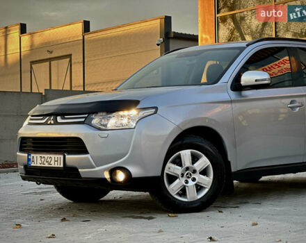 Сірий Міцубісі Аутлендер, об'ємом двигуна 2.36 л та пробігом 225 тис. км за 10500 $, фото 1 на Automoto.ua