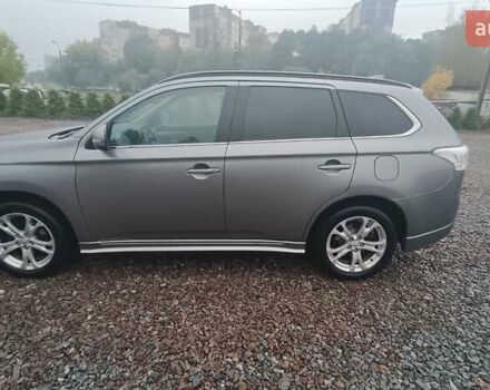 Серый Мицубиси Аутлендер, объемом двигателя 2.27 л и пробегом 232 тыс. км за 12500 $, фото 6 на Automoto.ua