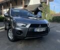 Серый Мицубиси Аутлендер, объемом двигателя 2 л и пробегом 136 тыс. км за 14999 $, фото 1 на Automoto.ua