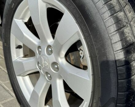 Серый Мицубиси Аутлендер, объемом двигателя 2.4 л и пробегом 239 тыс. км за 11700 $, фото 20 на Automoto.ua