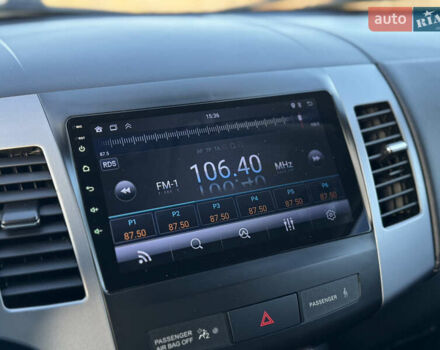 Серый Мицубиси Аутлендер, объемом двигателя 2.2 л и пробегом 171 тыс. км за 12700 $, фото 61 на Automoto.ua