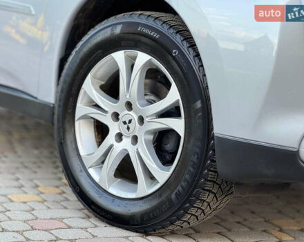 Серый Мицубиси Аутлендер, объемом двигателя 2.2 л и пробегом 188 тыс. км за 13500 $, фото 57 на Automoto.ua