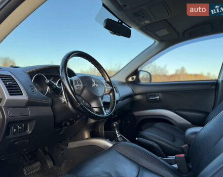 Серый Мицубиси Аутлендер, объемом двигателя 2.2 л и пробегом 171 тыс. км за 12700 $, фото 49 на Automoto.ua