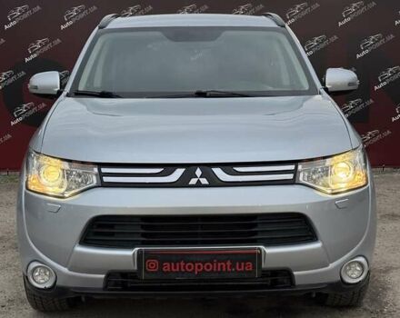 Серый Мицубиси Аутлендер, объемом двигателя 2.2 л и пробегом 190 тыс. км за 14950 $, фото 1 на Automoto.ua