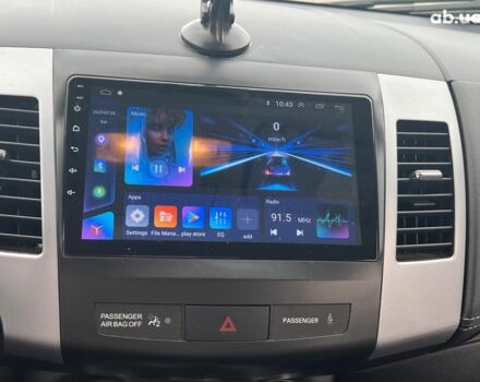 Мицубиси Аутлендер 2012 в Львове на Automoto.ua Серый Мицубиси Аутлендер, объемом двигателя 2.2 л и пробегом 169 тыс. км за 14500 $, фото 23 на Automoto.ua