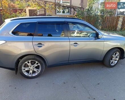 Серый Мицубиси Аутлендер, объемом двигателя 2.27 л и пробегом 240 тыс. км за 12150 $, фото 8 на Automoto.ua