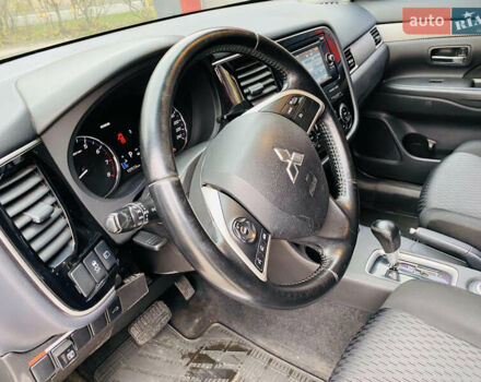 Сірий Міцубісі Аутлендер, об'ємом двигуна 2.36 л та пробігом 135 тис. км за 11500 $, фото 16 на Automoto.ua