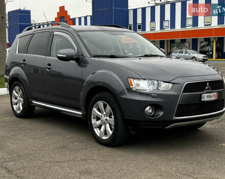 Серый Мицубиси Аутлендер, объемом двигателя 2.2 л и пробегом 206 тыс. км за 11999 $, фото 1 на Automoto.ua