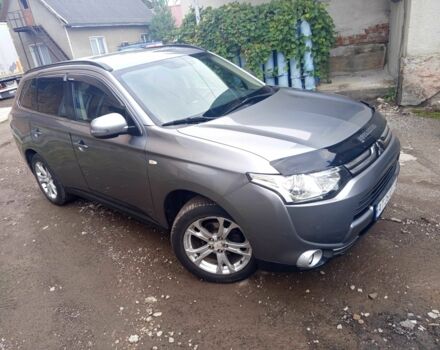 Сірий Міцубісі Аутлендер, об'ємом двигуна 2.3 л та пробігом 248 тис. км за 11550 $, фото 4 на Automoto.ua