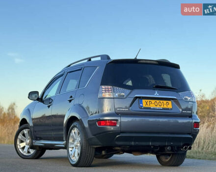 Серый Мицубиси Аутлендер, объемом двигателя 2.2 л и пробегом 171 тыс. км за 12700 $, фото 37 на Automoto.ua