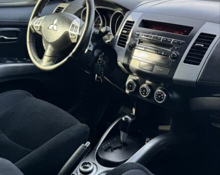 Серый Мицубиси Аутлендер, объемом двигателя 2.4 л и пробегом 239 тыс. км за 11700 $, фото 17 на Automoto.ua