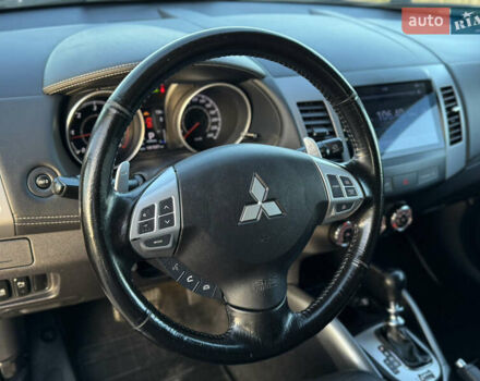 Серый Мицубиси Аутлендер, объемом двигателя 2.2 л и пробегом 171 тыс. км за 12700 $, фото 55 на Automoto.ua