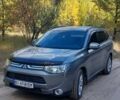 Серый Мицубиси Аутлендер, объемом двигателя 2.36 л и пробегом 167 тыс. км за 12499 $, фото 1 на Automoto.ua