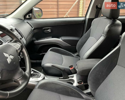 Серый Мицубиси Аутлендер, объемом двигателя 2.2 л и пробегом 186 тыс. км за 12350 $, фото 41 на Automoto.ua