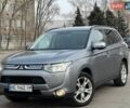 Серый Мицубиси Аутлендер, объемом двигателя 2.36 л и пробегом 201 тыс. км за 14500 $, фото 1 на Automoto.ua