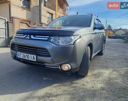 Серый Мицубиси Аутлендер, объемом двигателя 2.27 л и пробегом 240 тыс. км за 12150 $, фото 2 на Automoto.ua