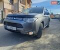 Серый Мицубиси Аутлендер, объемом двигателя 2.27 л и пробегом 240 тыс. км за 12150 $, фото 2 на Automoto.ua