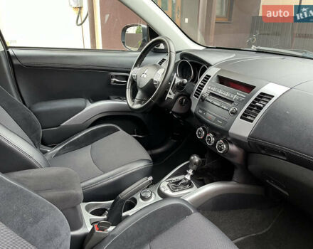 Серый Мицубиси Аутлендер, объемом двигателя 2.2 л и пробегом 186 тыс. км за 12350 $, фото 48 на Automoto.ua