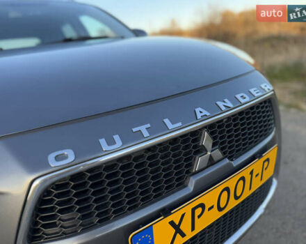 Серый Мицубиси Аутлендер, объемом двигателя 2.2 л и пробегом 171 тыс. км за 12700 $, фото 18 на Automoto.ua