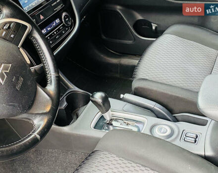 Сірий Міцубісі Аутлендер, об'ємом двигуна 2.36 л та пробігом 135 тис. км за 11500 $, фото 11 на Automoto.ua