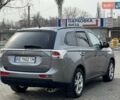 Серый Мицубиси Аутлендер, объемом двигателя 2.36 л и пробегом 201 тыс. км за 14500 $, фото 3 на Automoto.ua