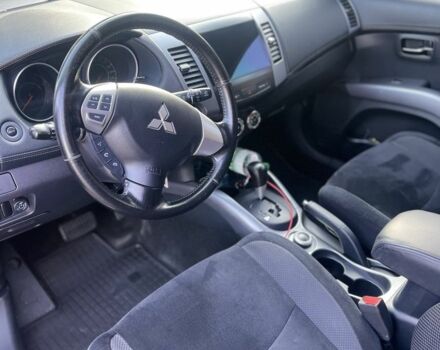 Серый Мицубиси Аутлендер, объемом двигателя 2 л и пробегом 136 тыс. км за 14999 $, фото 3 на Automoto.ua