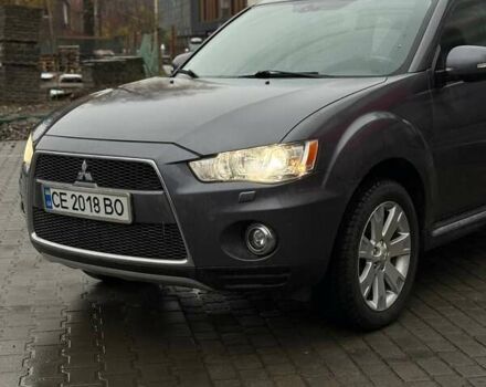 Серый Мицубиси Аутлендер, объемом двигателя 2.3 л и пробегом 160 тыс. км за 13900 $, фото 2 на Automoto.ua