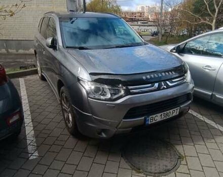 Серый Мицубиси Аутлендер, объемом двигателя 2.27 л и пробегом 232 тыс. км за 12500 $, фото 1 на Automoto.ua