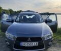 Сірий Міцубісі Аутлендер, об'ємом двигуна 2.3 л та пробігом 250 тис. км за 12800 $, фото 1 на Automoto.ua