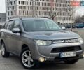 Серый Мицубиси Аутлендер, объемом двигателя 2.36 л и пробегом 201 тыс. км за 14500 $, фото 1 на Automoto.ua