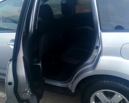 Серый Мицубиси Аутлендер, объемом двигателя 2 л и пробегом 203 тыс. км за 12000 $, фото 7 на Automoto.ua