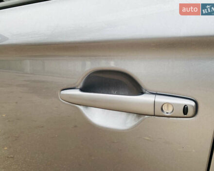 Серый Мицубиси Аутлендер, объемом двигателя 2.36 л и пробегом 131 тыс. км за 11800 $, фото 16 на Automoto.ua