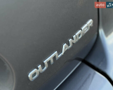 Серый Мицубиси Аутлендер, объемом двигателя 2.2 л и пробегом 171 тыс. км за 12700 $, фото 28 на Automoto.ua