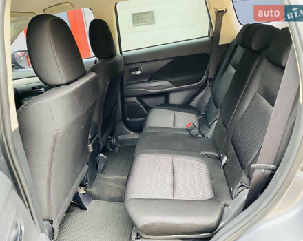 Серый Мицубиси Аутлендер, объемом двигателя 2.36 л и пробегом 131 тыс. км за 11800 $, фото 9 на Automoto.ua