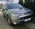 Серый Мицубиси Аутлендер, объемом двигателя 2.27 л и пробегом 167 тыс. км за 12500 $, фото 1 на Automoto.ua