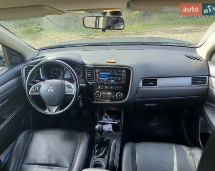 Серый Мицубиси Аутлендер, объемом двигателя 2.27 л и пробегом 240 тыс. км за 12150 $, фото 18 на Automoto.ua