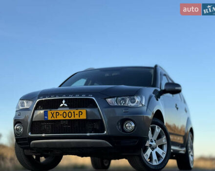 Серый Мицубиси Аутлендер, объемом двигателя 2.2 л и пробегом 171 тыс. км за 12700 $, фото 3 на Automoto.ua