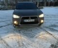 Серый Мицубиси Аутлендер, объемом двигателя 3 л и пробегом 220 тыс. км за 7700 $, фото 1 на Automoto.ua