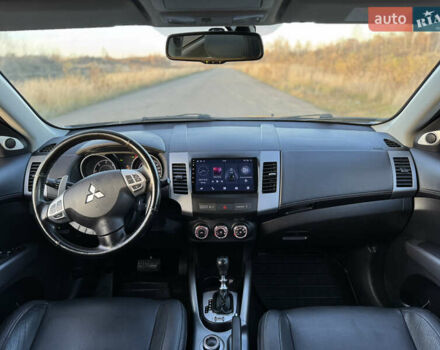 Серый Мицубиси Аутлендер, объемом двигателя 2.2 л и пробегом 171 тыс. км за 12700 $, фото 82 на Automoto.ua