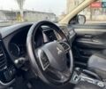 Серый Мицубиси Аутлендер, объемом двигателя 2.36 л и пробегом 201 тыс. км за 14500 $, фото 21 на Automoto.ua