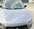 Серый Мицубиси Аутлендер, объемом двигателя 2 л и пробегом 145 тыс. км за 12200 $, фото 5 на Automoto.ua