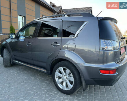 Серый Мицубиси Аутлендер, объемом двигателя 2.2 л и пробегом 186 тыс. км за 12350 $, фото 28 на Automoto.ua