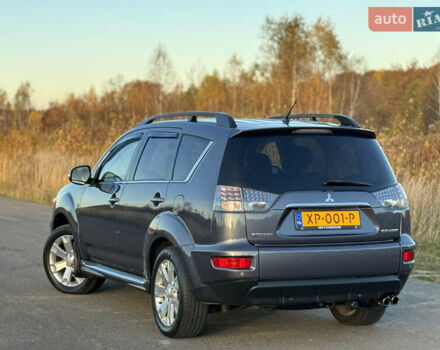 Серый Мицубиси Аутлендер, объемом двигателя 2.2 л и пробегом 171 тыс. км за 12700 $, фото 38 на Automoto.ua