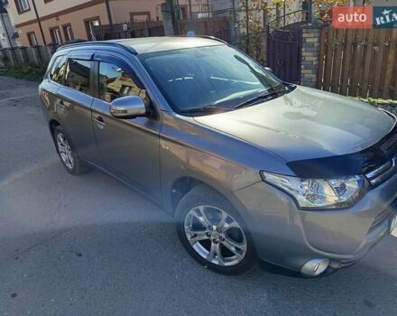 Серый Мицубиси Аутлендер, объемом двигателя 2.27 л и пробегом 240 тыс. км за 12150 $, фото 5 на Automoto.ua