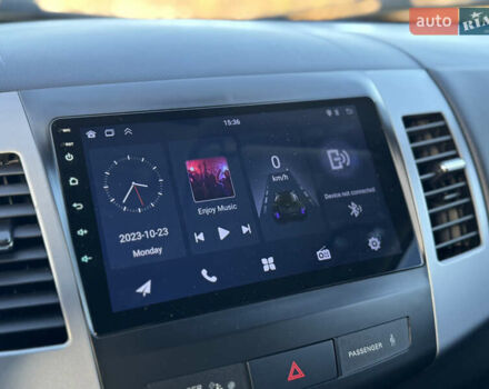 Серый Мицубиси Аутлендер, объемом двигателя 2.2 л и пробегом 171 тыс. км за 12700 $, фото 62 на Automoto.ua