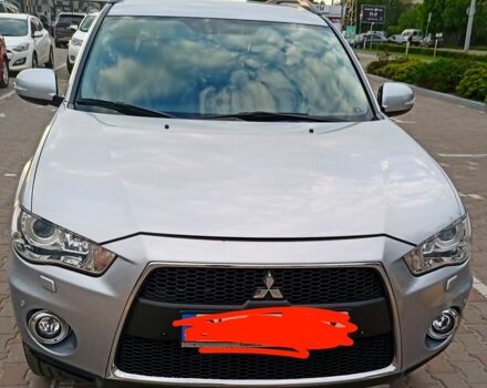 Серый Мицубиси Аутлендер, объемом двигателя 2.4 л и пробегом 145 тыс. км за 11000 $, фото 2 на Automoto.ua